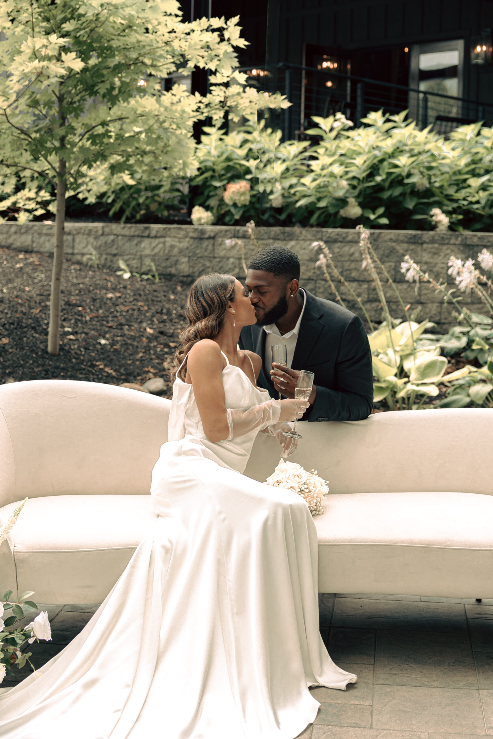 Wedding couple sitting on sofa